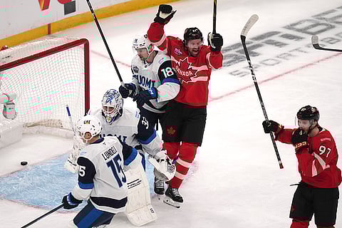 4 Nations Face-Off, Canada vs Finland: Canada's Mark Stone, center, celebrates after a goal by Connor McDavid
