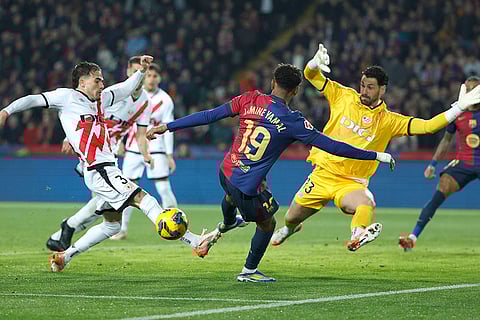 La Liga 2024-25: Rayo's Pep Chavarria and goalkeeper Augusto Batalla, right, in action against Barcelona's Lamine Yamal
