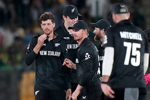 Champions Trophy 2025 Match 1, PAK vs NZ: New Zealand's Daryl Mitchell, left, celebrates after taking the wicket of Pakistan's Tayyab Tahir
