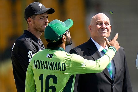 Champions Trophy 2025 Match 1, PAK vs NZ: Pakistan's Mohammad Rizwan, center, flips the coin for toss