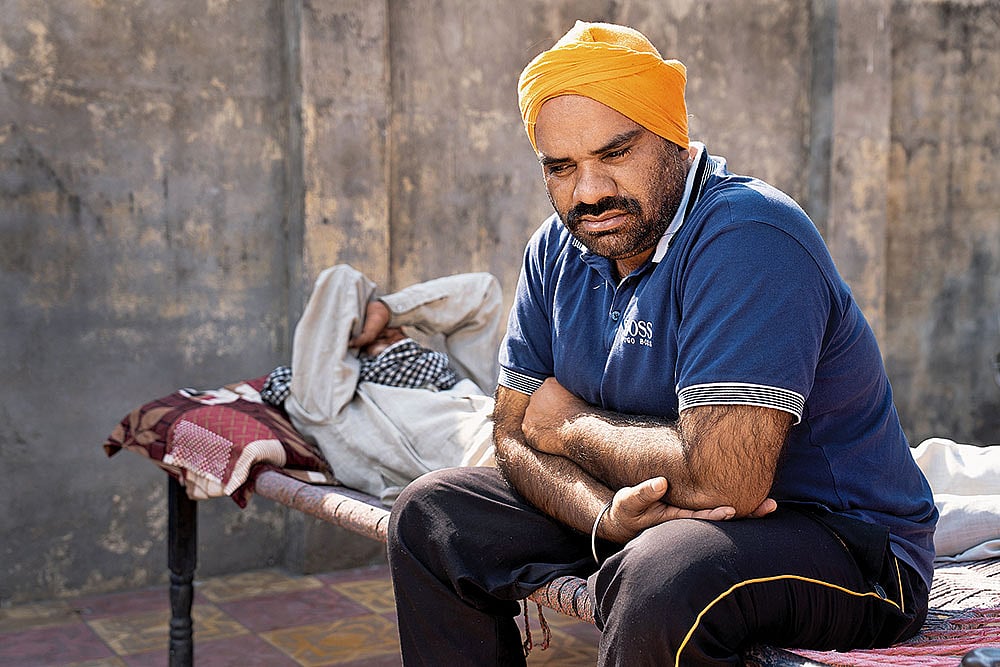| Photo: Suresh K. Pandey : The American Dream: Daler Singh, 36, a resident of Salempur village in Punjab, went to the US via the dunki route