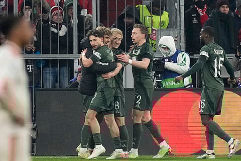 Champions League Soccer playoff second leg: Celtic's Nicolas Kuehn celebrates with teammates after scoring his side's opening goal