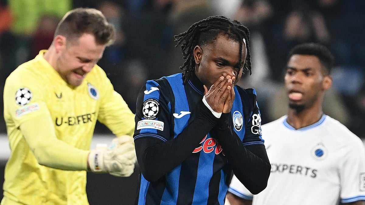 Ademola Lookman reacts after seeing his penalty saved - null