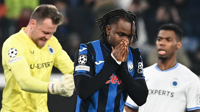 Ademola Lookman reacts after seeing his penalty saved - null