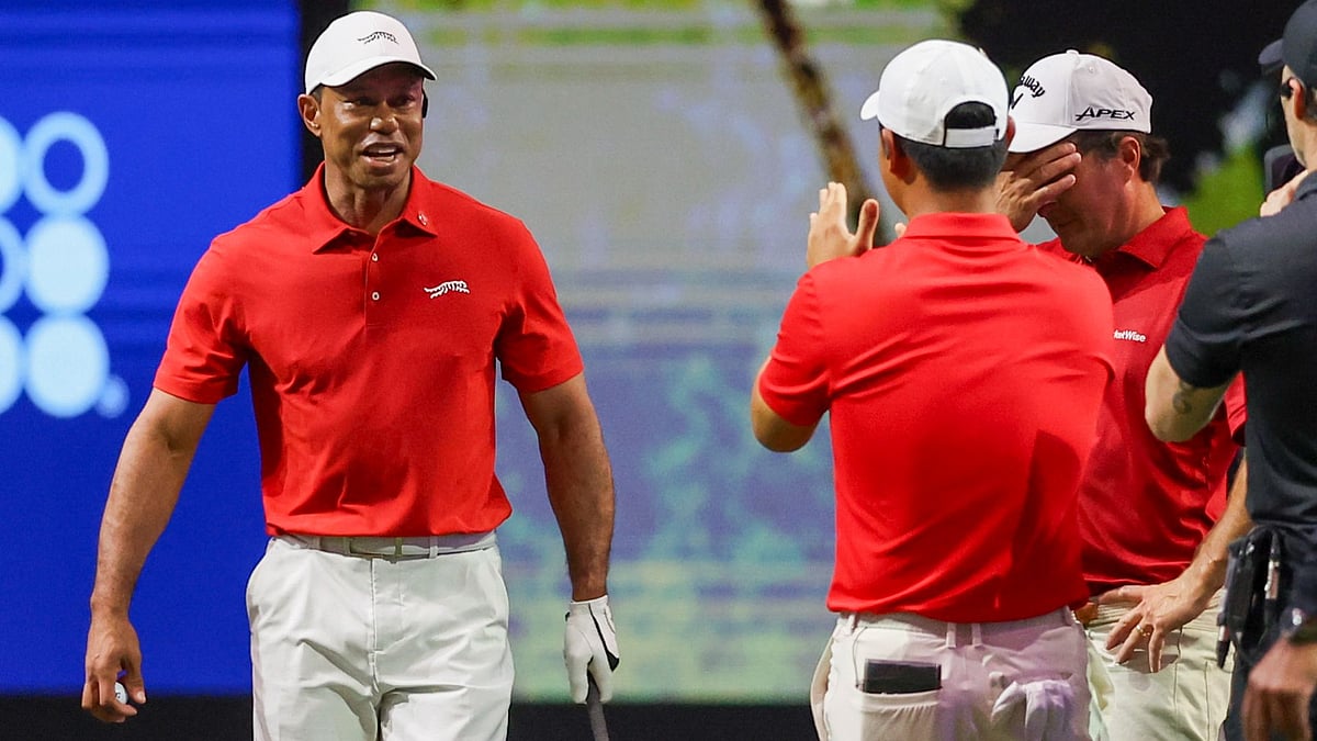 Woods looks on his disbelief at the TGL