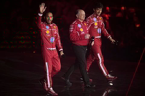 F1 75 Live launch event: Ferrari's driver Lewis Hamilton, team principal Frederic Vasseur, centre, and Charles Leclerc