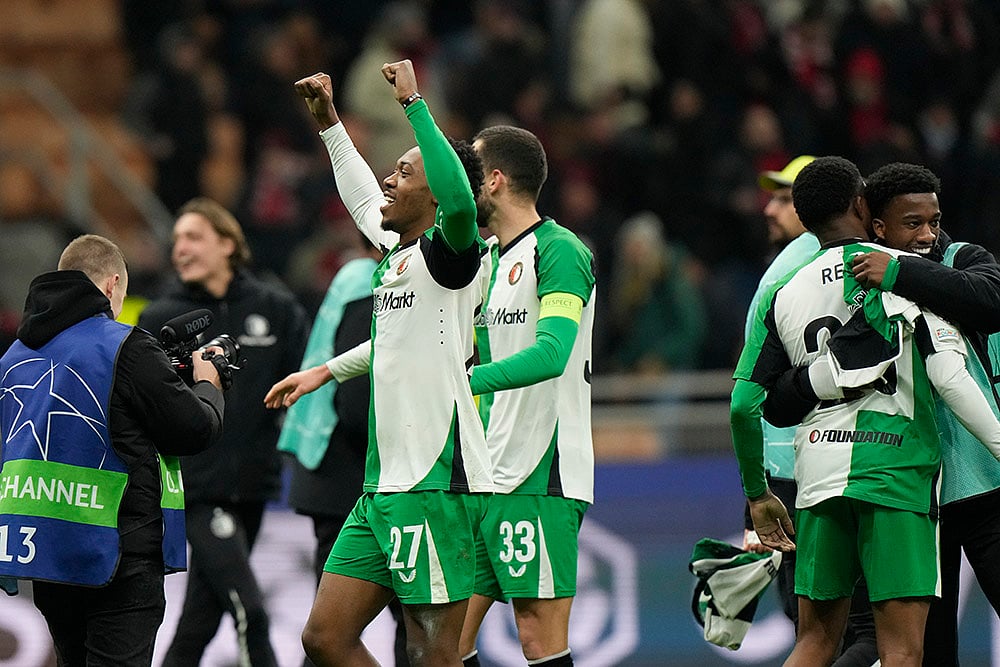 | Photo: AP/Luca Bruno : Champions League Soccer playoff second leg: Feyenoord's Antoni Milambo celebrates with teammates after the match
