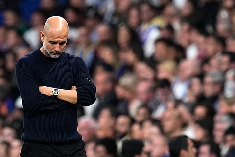 Champions League playoff second leg: Manchester City's head coach Pep Guardiola grimaces