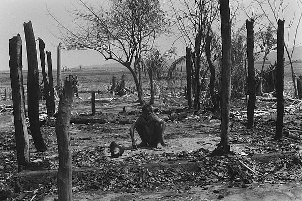 Santosh BASAK/Gamma-Rapho via Getty Images : A survivor of the massacre at Nellie in 1983