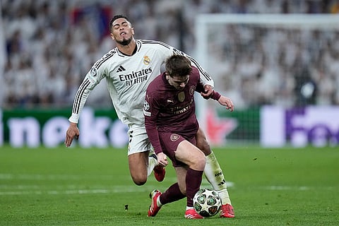 Champions League playoff second leg: Real Madrid's Jude Bellingham stops Manchester City's James McAtee