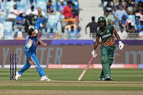Champions Trophy 2025 Match 2, IND vs BAN: India's Kuldeep Yadav, left, bowls a delivery
