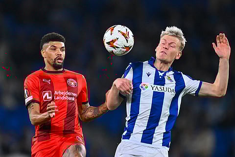 Europa League playoff second leg, Real Sociedad and Midtjylland: Real Sociedad's Orri Oskarsson duels for the ball with Midtjylland's Juninho