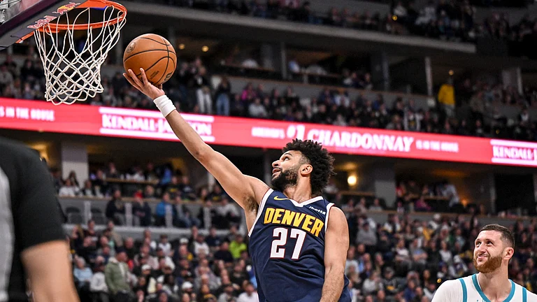 Jamal Murray helped the Denver Nuggets beat the Charlotte Hornets for their ninth straight win. - null