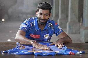 | Photo: Mumbai Indians : ICC Test Player of the year 2024 Jasprit Bumrah with the new jersey of Mumbai Indians ahead of the Indian Premier League 2025 season.
