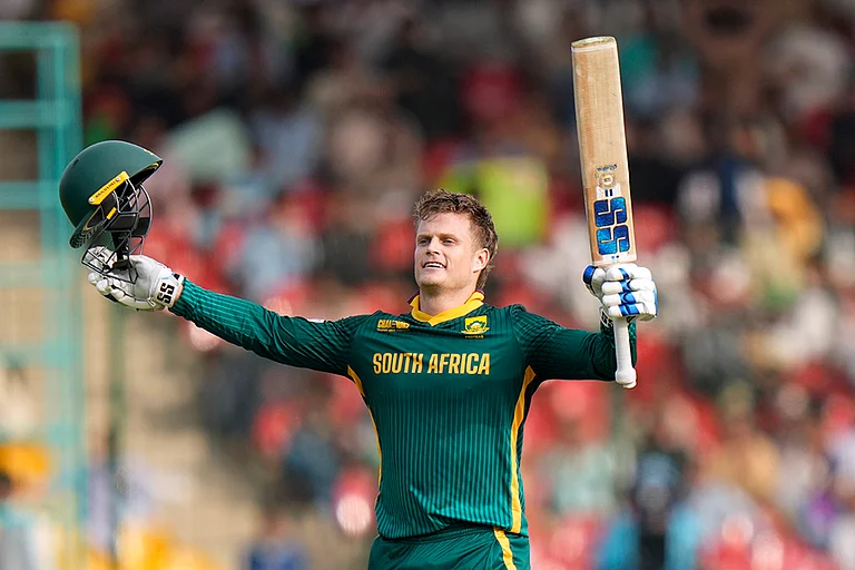 Champions Trophy 2025 Match 3, AFG vs SA: South Africa's Ryan Rickelton celebrates after scoring century - | Photo: AP/Anjum Naveed