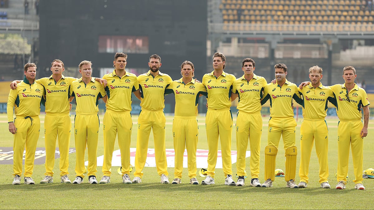 Photo: X | Cricket Australia : Australia cricket team during the national anthem in Lahore's Gaddafi Stadium.