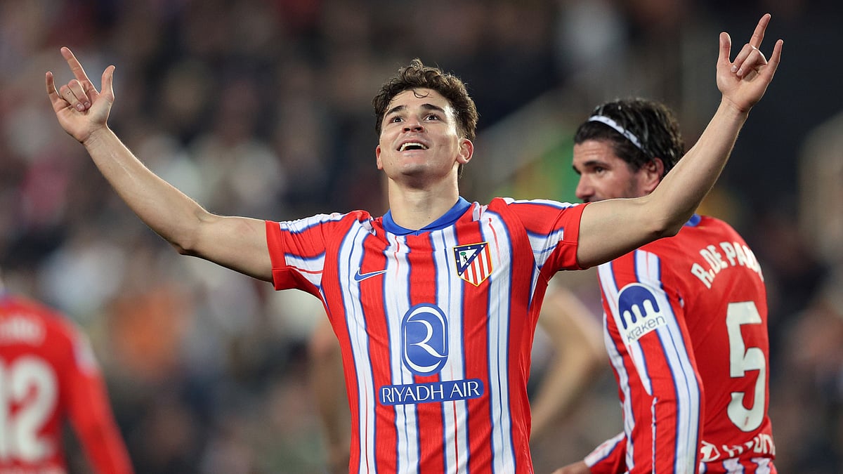 Julian Alvarez celebrates after scoring one of his two goals against Valencia - null