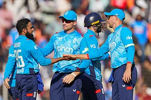 (AP Photo/ Ajit Solanki ) : England's Adil Rashid, left, celebrates the wicket of India's Hardik Pandya with his team mates during the third one day international cricket match between India and England in Ahmedabad , India, Wednesday, Feb. 12, 2025.