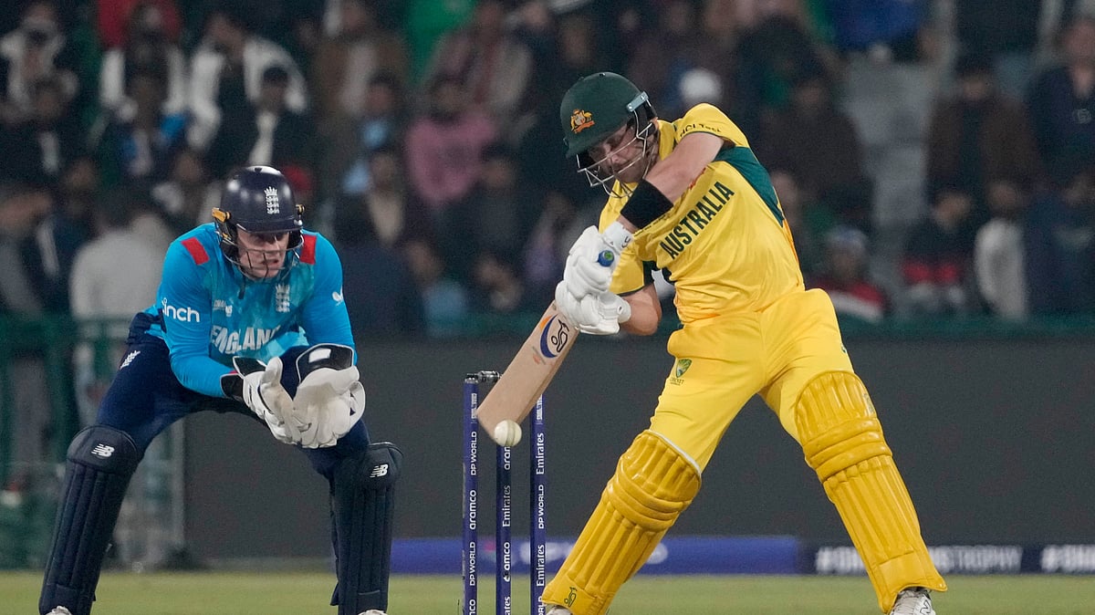 Australias Josh Inglis, right, plays a shot. AP Photo