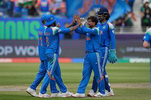 ICC Champions Trophy, IND vs PAK: India's Kuldeep Yadav celebrates with teammate the wicket of Pakistan's Salman Ali Agha