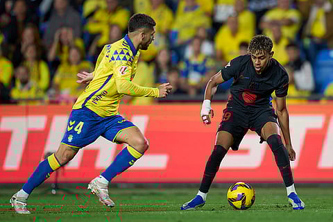 La Liga 2024-25: Barcelona's Lamine Yamal duels for the ball with Las Palmas' Alex Suarez