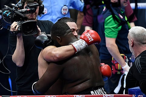 Saudi Arabia Parker vs Bakole Boxing: Joseph Parker, left, hugs Martin Bakole after winning the fight