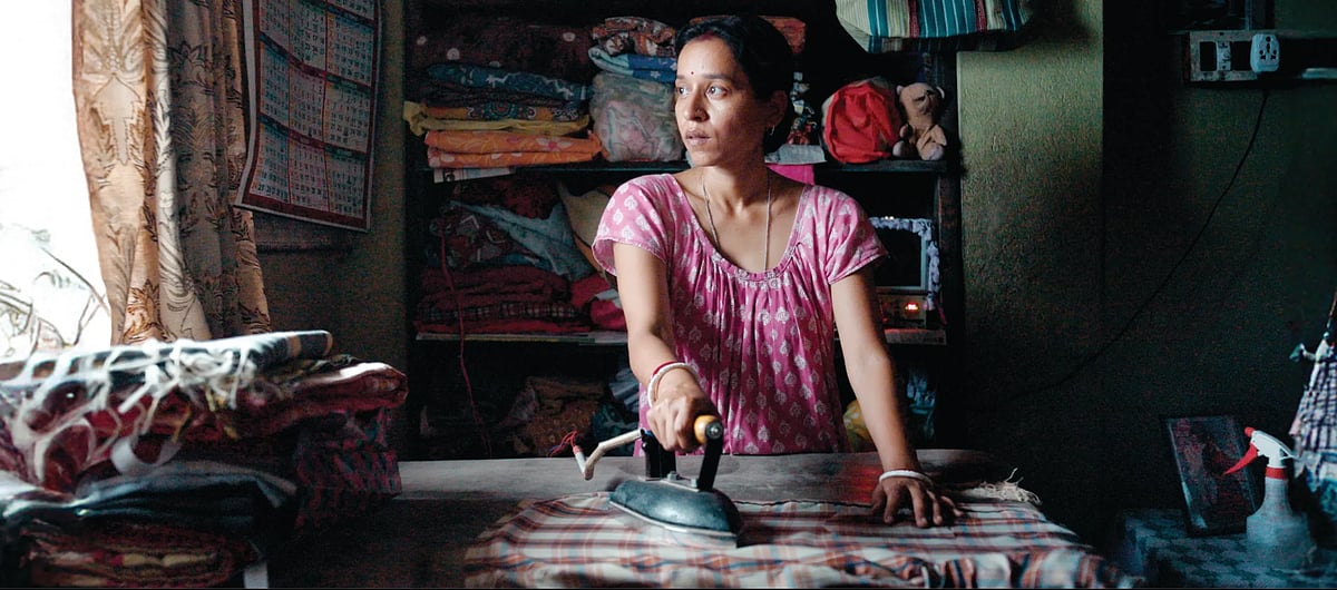 IMDB : A still from Baksho Bondi ('Shadowbox')