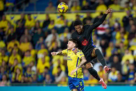 La Liga 2024-25: Barcelona's Alejandro Balde duels for the ball with Las Palmas' Viti Rozada