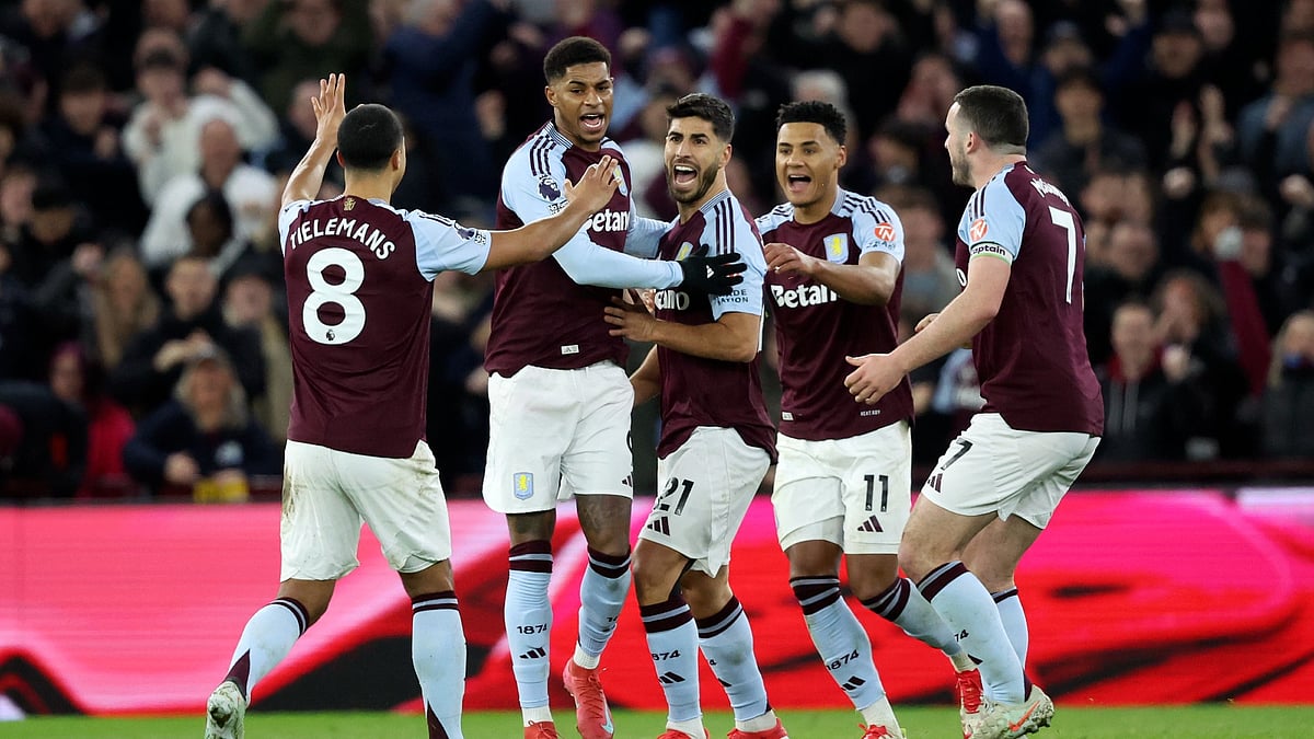 Marcus Rashford celebrates with his Villa team-mates - null