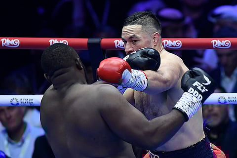 Saudi Arabia Parker vs Bakole Boxing: Joseph Parker, right, punches Martin Bakole