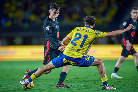 La Liga 2024-25: Barcelona's Pedri duels for the ball with Las Palmas' Stefan Bajcetic