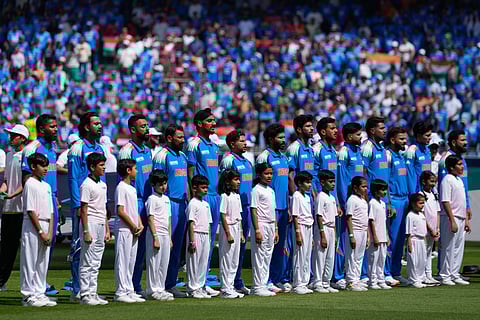 Players of India stands for their national anthem before the start of ICC Champions Trophy cricket match between India and Pakistan at Dubai International Cricket Stadium, United Arab Emirates, Sunday, Feb. 23, 2025.