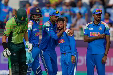 ICC Champions Trophy, IND vs PAK: India's Kuldeep Yadav celebrates with teammate the wicket of Pakistan's Shaheen Afridi