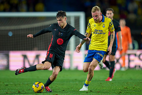 La Liga 2024-25: Barcelona's Pedri duels for the ball with Las Palmas' Oli McBurie