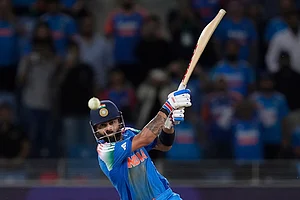 | Photo: AP/Altaf Qadri : ICC Champions Trophy, IND vs PAK: India's Virat Kohli hits winning runs