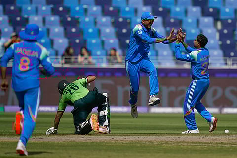 ICC Champions Trophy, IND vs PAK: India's Axar Patel celebrates with Kuldeep Yadav after he run-out Pakistan's Imam-ul-Haq