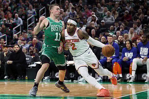 NBA 2024-25, Knicks vs Celtics: Knicks' Miles McBride (2) drives past Celtics' Payton Pritchard