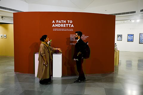 A viewer in conversation with artist Lipoklemla Ao |