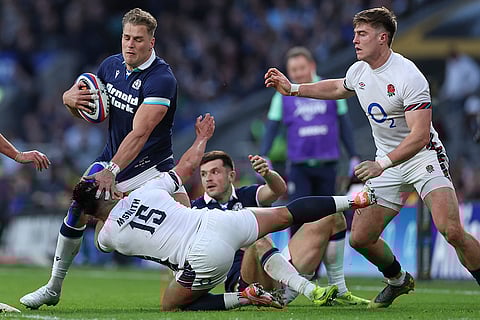 Calcutta Cup 2025: Scotland's Duhan van der Merwe holds off England's Marcus Smith