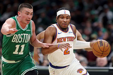 NBA 2024-25, Knicks vs Celtics: Knicks' Miles McBride (2) drives past Boston Celtics' Payton Pritchard