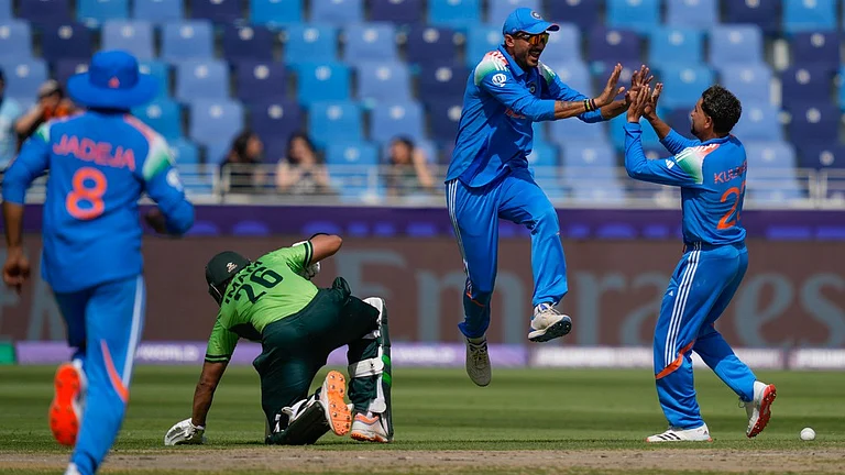India beat Pakistan by six wickets in the Champions Trophy. - AP