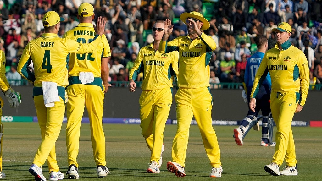 AP : Australia beat arch-rivals England by five wickets in Lahore.