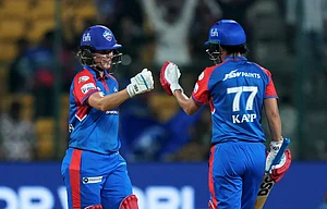(PTI Photo/Shailendra Bhojak) : Bengaluru: Delhi Capitals' batter Jess Jonassen and Marizanne Kapp celebrate after winning a Women's Premier League (WPL) 2025 cricket match between Delhi Capitals and Gujarat Giants, at the M Chinnaswamy Stadium, in Bengaluru, Tuesday, Feb. 25, 2025.