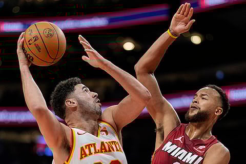 NBA 2024-25: Hawks forward Georges Niang (20) shoots against Miami Heat 