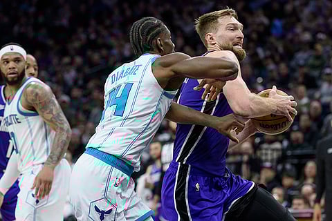 NBA 2024-25: Hornets forward Moussa Diabate, left, guards Kings forward Domantas Sabonis