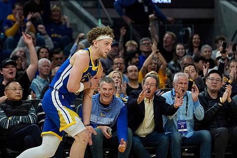 NBA 2024-25, Mavericks vs Warriors: Warriors guard Brandin Podziemski reacts after making a 3-point basket