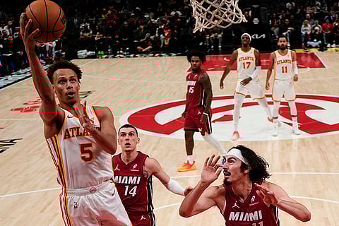NBA 2024-25: Hawks guard Dyson Daniels (5) drives to the basket