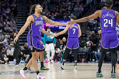 NBA 2024-25: Kings guard Devin Carter congratulates teammate Isaiah Crawford