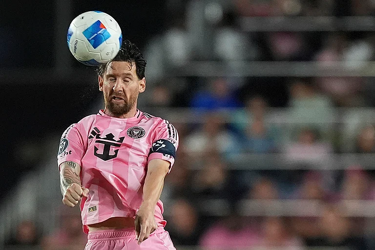 CONCACAF Champions Cup: Inter Miami forward Lionel Messi heads the ball - | Photo: AP/Rebecca Blackwell