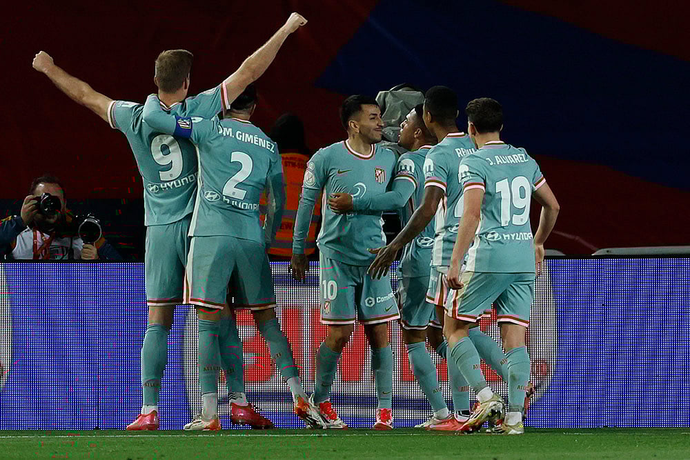 | Photo: AP/Joan Monfort : Copa Del Rey SFs: Atletico players celebrate after a goal